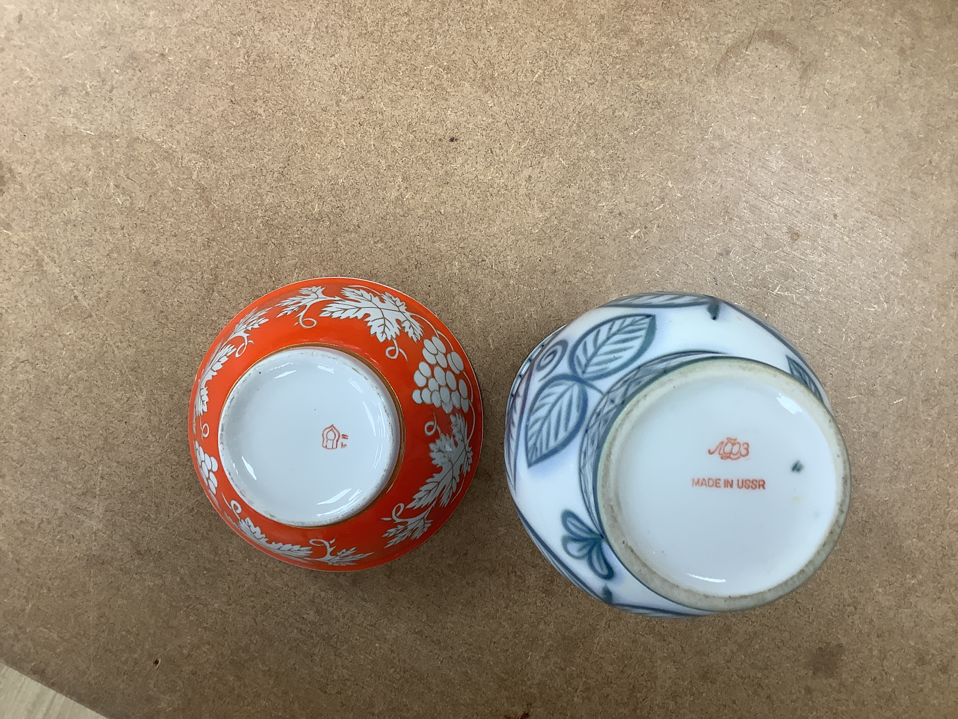 A pair of Russian porcelain models of French bulldogs, a part Chinese (Russian) tea set and a vase